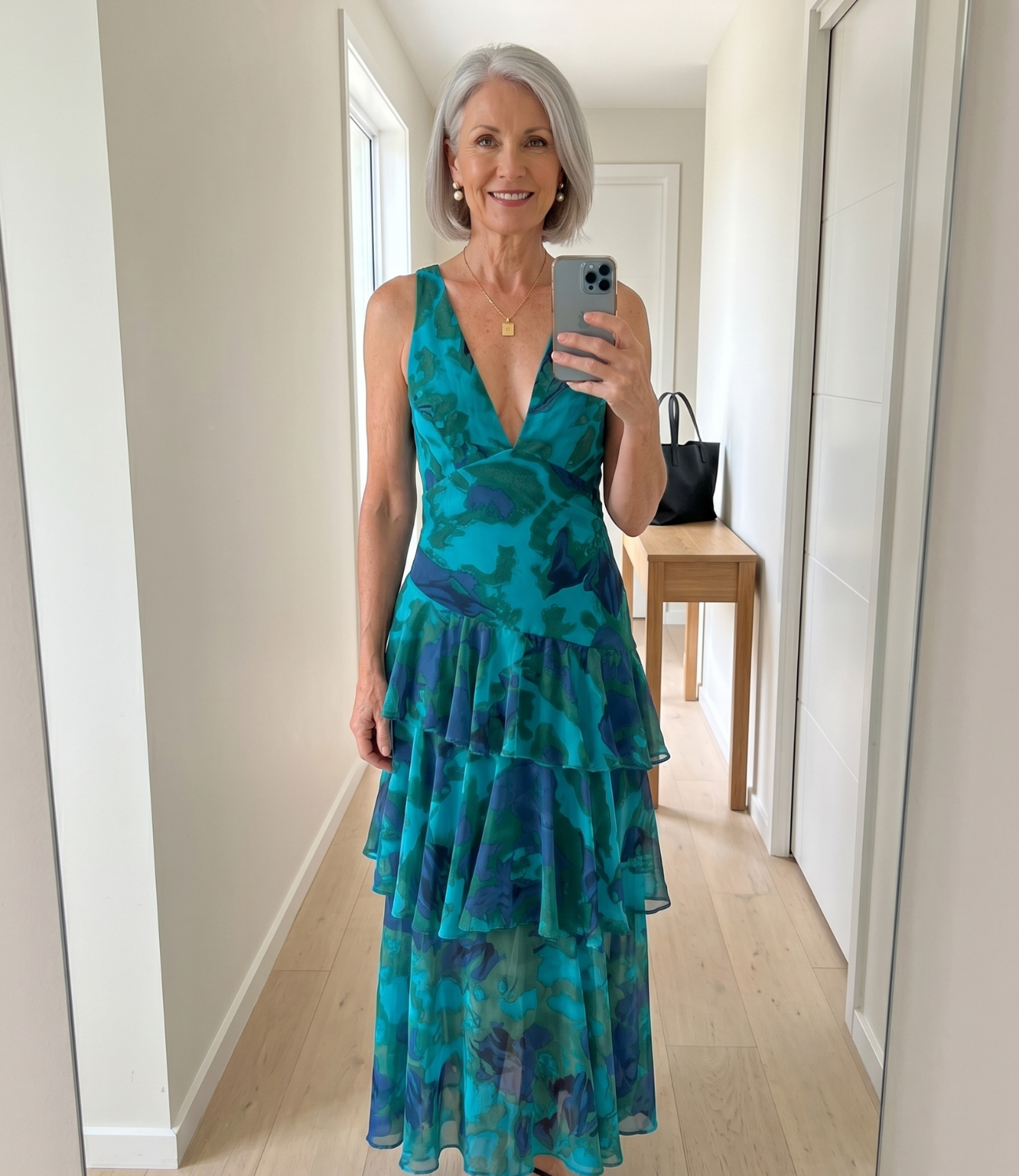 Woman aged 57 in elegant dress hallway mirror selfie — Emmie & Ellie verified buyer review
