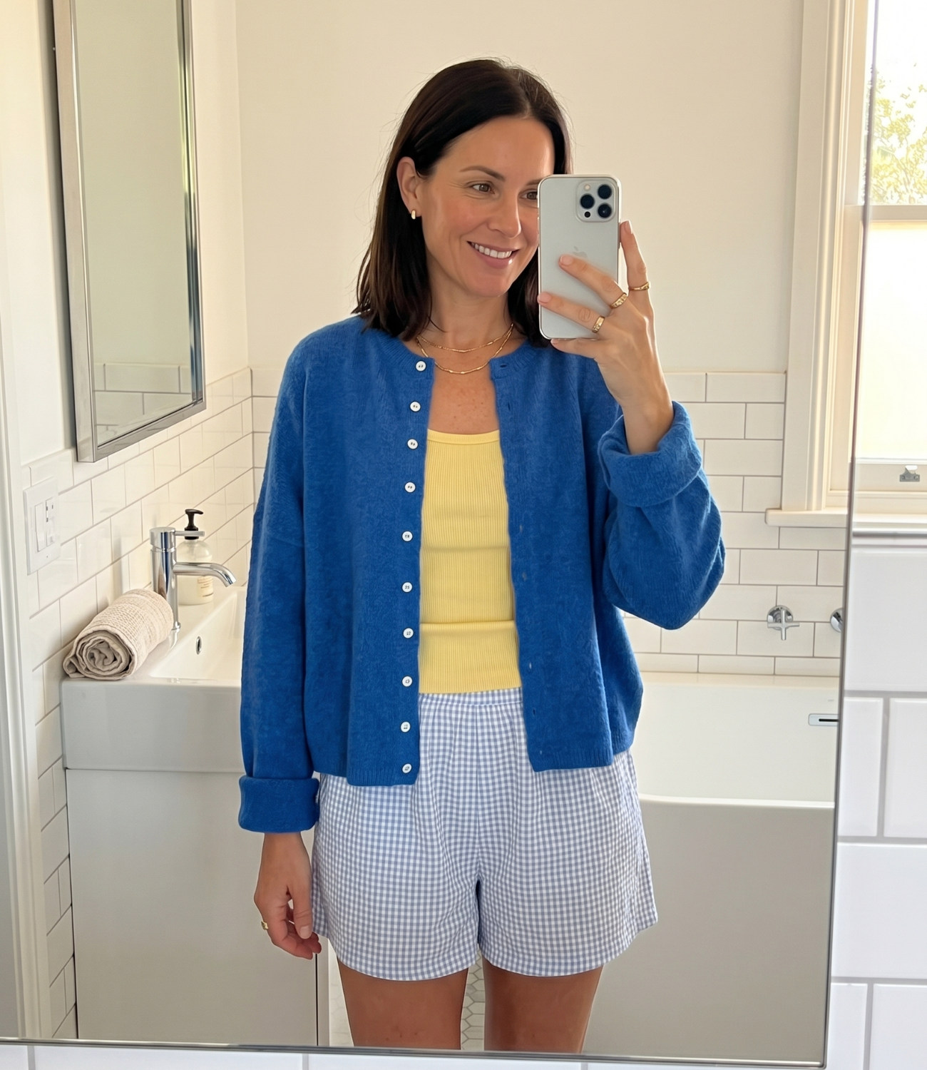 Woman in bathroom mirror selfie wearing cardigan — Emmie & Ellie verified buyer review